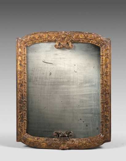 MIRROR in a carved and gilded wood frame,...