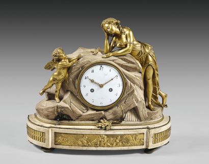 White marble and ormolu clock featuring an...