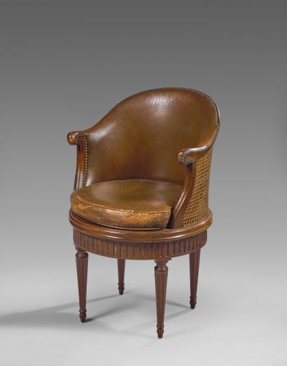 Mahogany caned desk armchair with revolving...