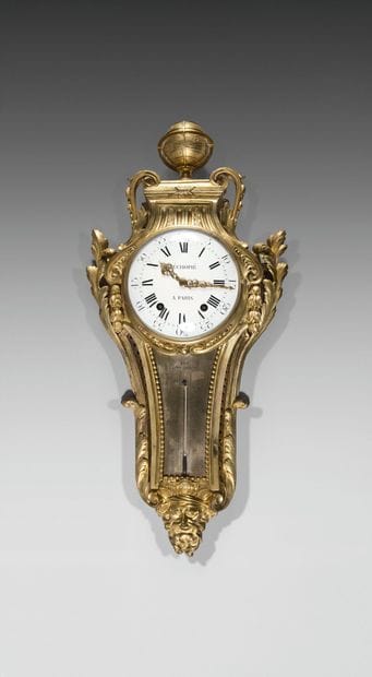 Mercury barometer and cartel in a pair of...