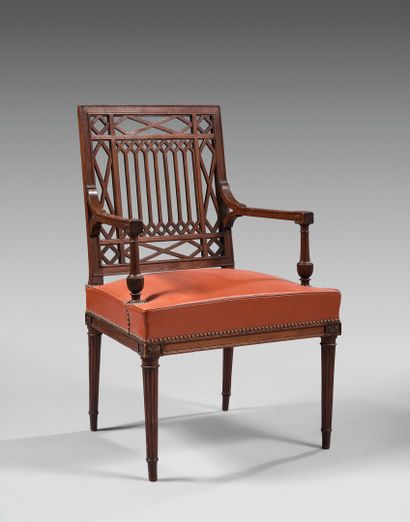 Walnut armchair with flat openwork back featuring...