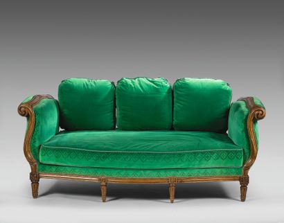 Molded walnut cross bed with two equal upside-down...