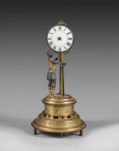 Pendule de table en bronze doré ornée d'un...