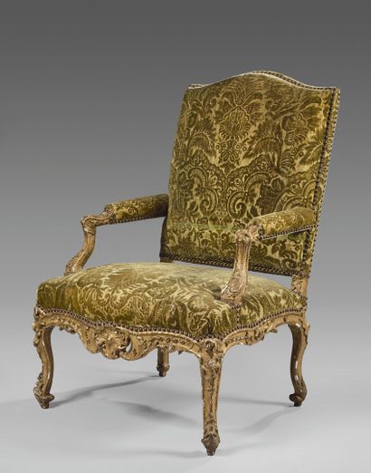 Large curved flat-back armchair upholstered...