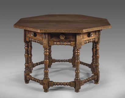 Octagonal walnut table opening with four...