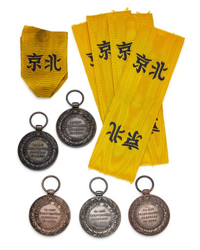 Set of five Chinese medals, unsigned, wide-flange...