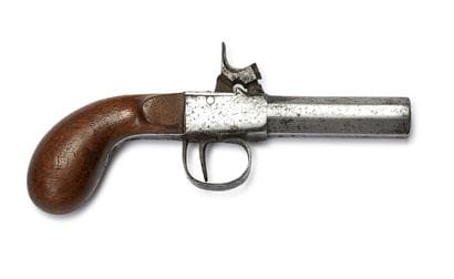 Pistolet à coffre à percussion. 
Canon à...