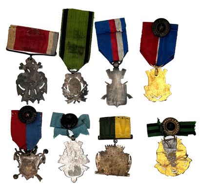 Set of eight shooting company medals or badges:...
