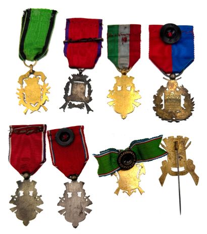 Set of eight shooting company medals or badges:...