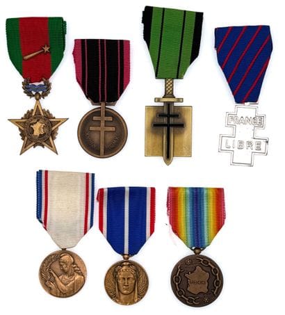 World War II - Lot of seven decorations in...