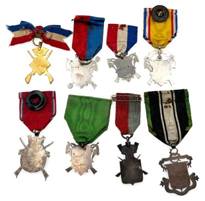 Set of eight shooting company medals or badges:...