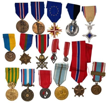 Postwar - Lot of sixteen decorations in ordinance...