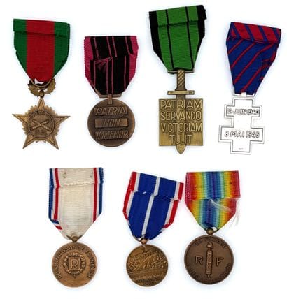 World War II - Lot of seven decorations in...