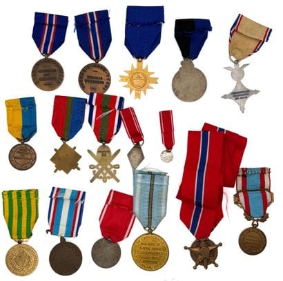 Postwar - Lot of sixteen decorations in ordinance...