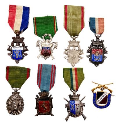 Set of eight shooting company medals or badges:...