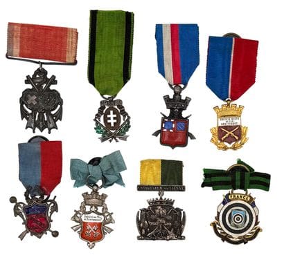 Set of eight shooting company medals or badges:...