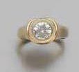 BAGUE en or jaune sertie d'un diamant de...