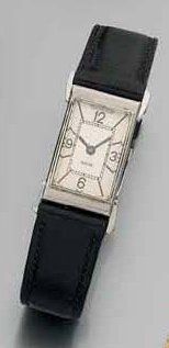 MONTRE-BRACELET de dame en métal, de forme...