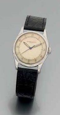 MONTRE-BRACELET d'homme, en métal, de forme...