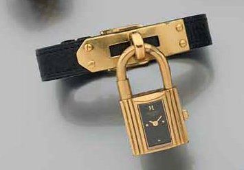 MONTRE-BRACELET de dame en métal doré, de...