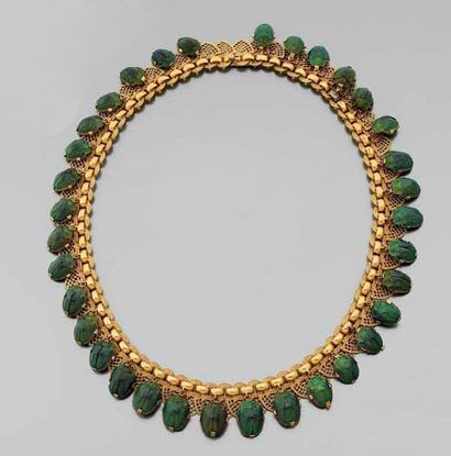 COLLIER articulé en or jaune gravé et ajouré...