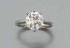 BAGUE en or gris, sertie d'un diamant rond...
