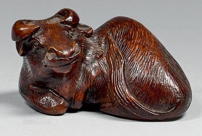 JAPON - XXe siècle
Netsuke en bois, buffle...