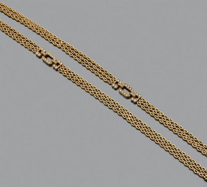 Collier trois brins articulés en or jaune...
