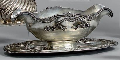 Saucière et son présentoir de forme ovale...