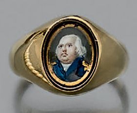 Lot comprenant: une bague chevalière en or...