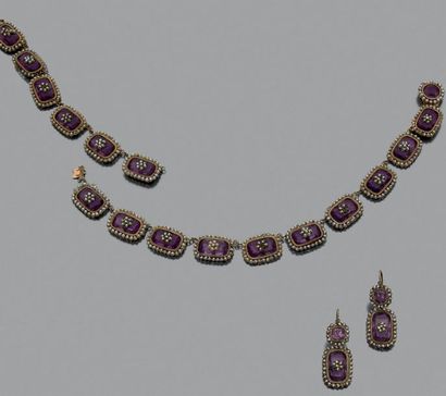 Parure en or 585 millièmes composée de motifs...
