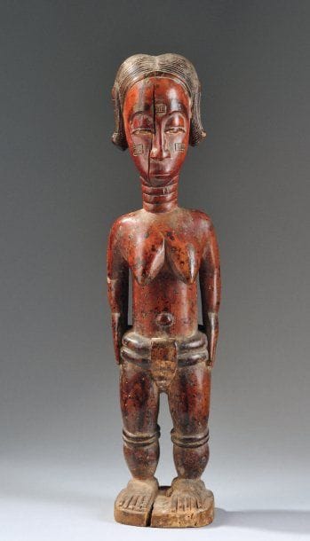 - STATUETTE ANTHROPOMORPHE elle présente...
