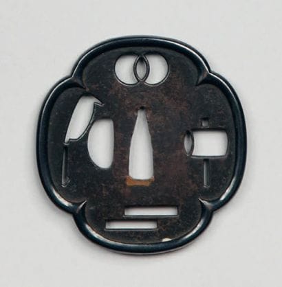 Tsuba mokko gata en fer ajouré d'un oiseau...