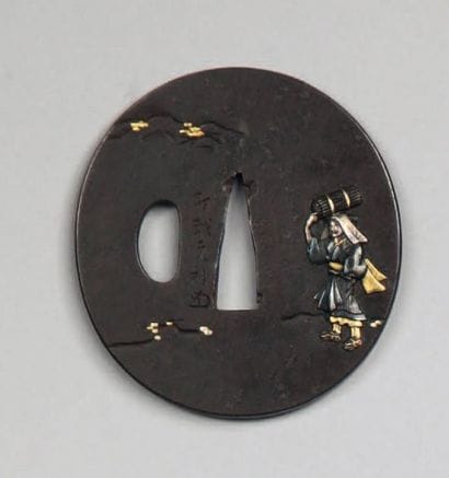 Tsuba nagamaru gata en fer, décorée sur une...