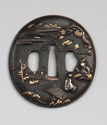Tsuba nagamaru gata en fer, décorée en shakudo...