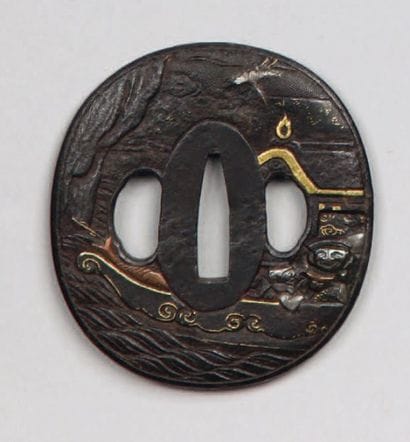 Tsuba nagamaru gata en fer, décorée en relief...