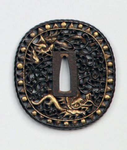 Tsuba nagamaru gata en fer de style namban,...