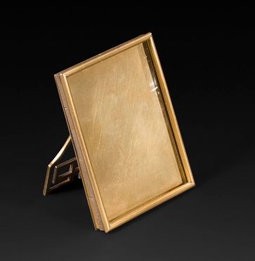 CARTIER

Rectangular table frame in two-tone...