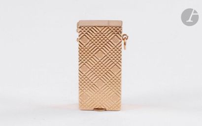 BOUCHERON Paris. Petrol lighter in yellow...