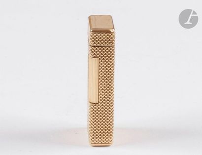 BOUCHERON Paris. Gas lighter in yellow gold...