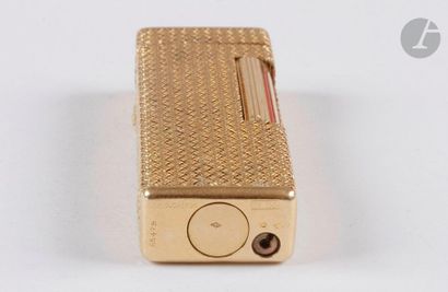 CORKER. Gas lighter in yellow gold 750 0/00....