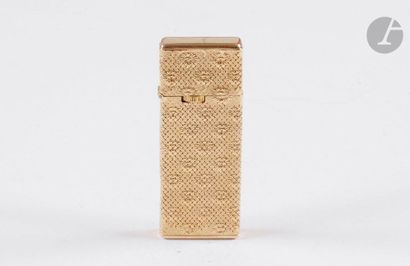 CORKER. Gas lighter in yellow gold 750/00....