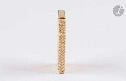 CORKER. Gas lighter in yellow gold 750/00....