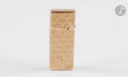 CORKER. Gas lighter in yellow gold 750/00....