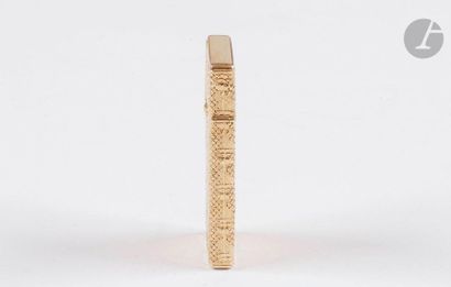 CORKER. Gas lighter in yellow gold 750/00....