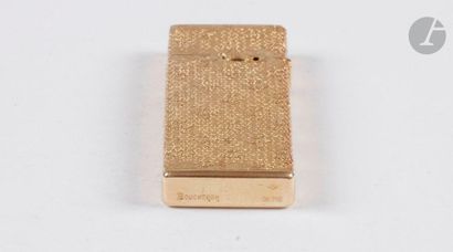 CORKER. Gas lighter in yellow gold 750/00....