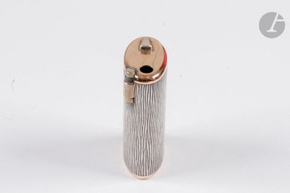 BOUCHERON Paris. Table gas lighter in silver...