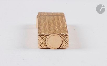VAN CLEEF & ARPELS. Petrol lighter in yellow...