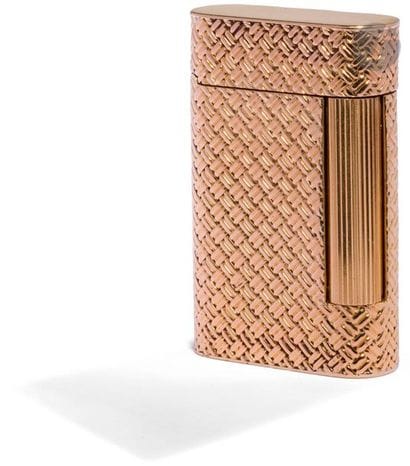 VAN CLEEF & ARPELS. Petrol lighter in yellow...