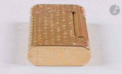 VAN CLEEF & ARPELS. Petrol lighter in yellow...